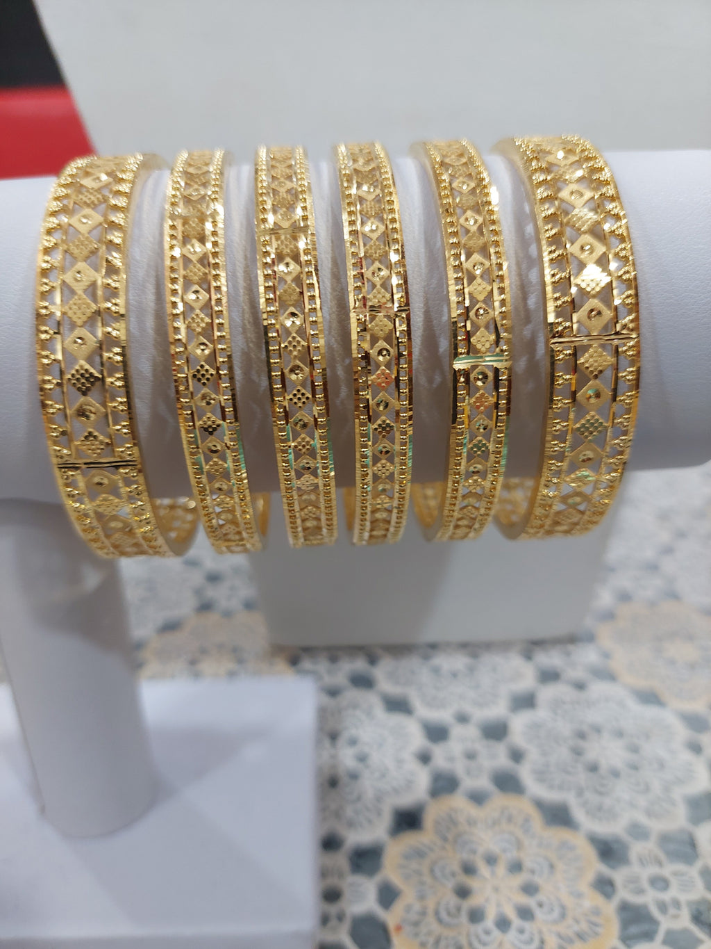 6 piece bangles not 916 gold. Code 2943