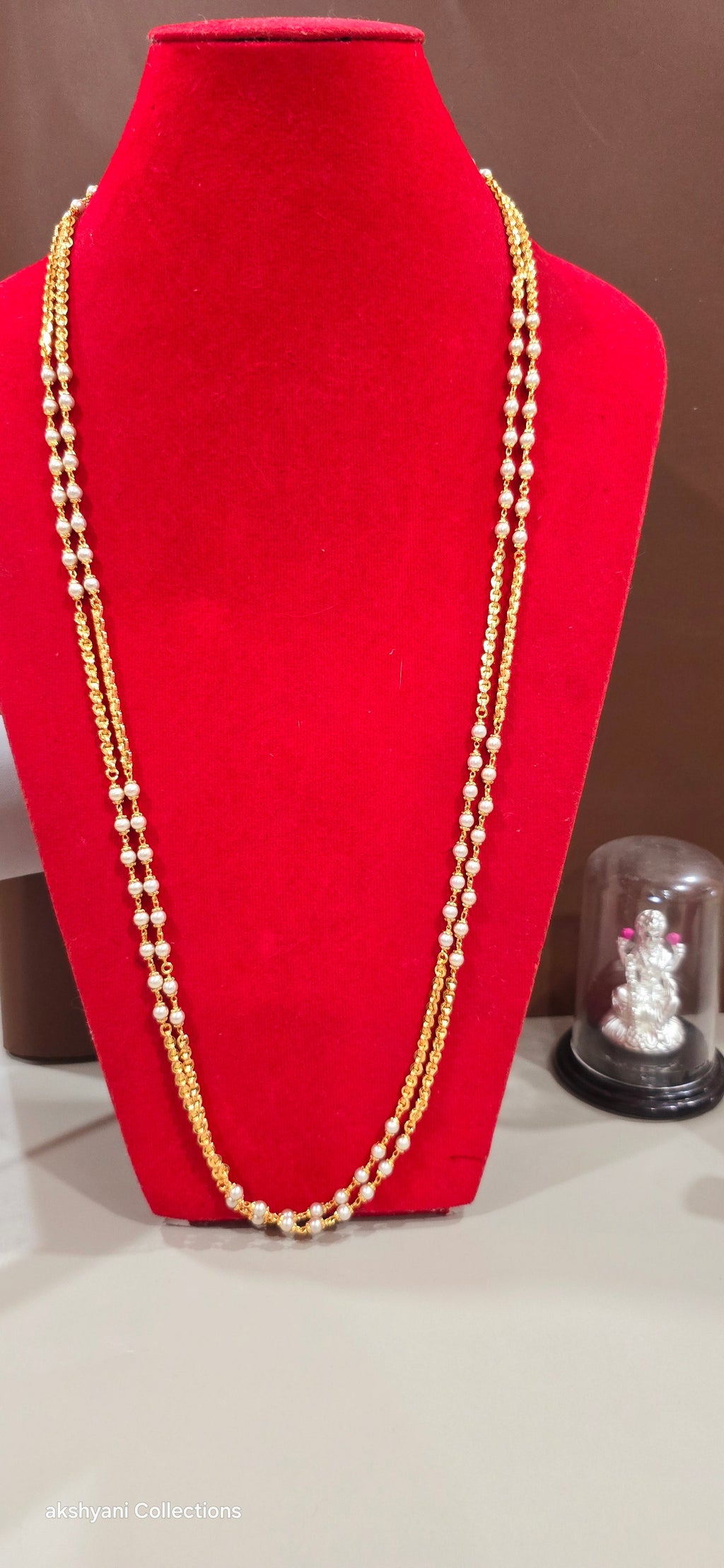 2 layer white pearls with zig zag cut chain.Not 916 gold.24k electroplating items made in Singapore.