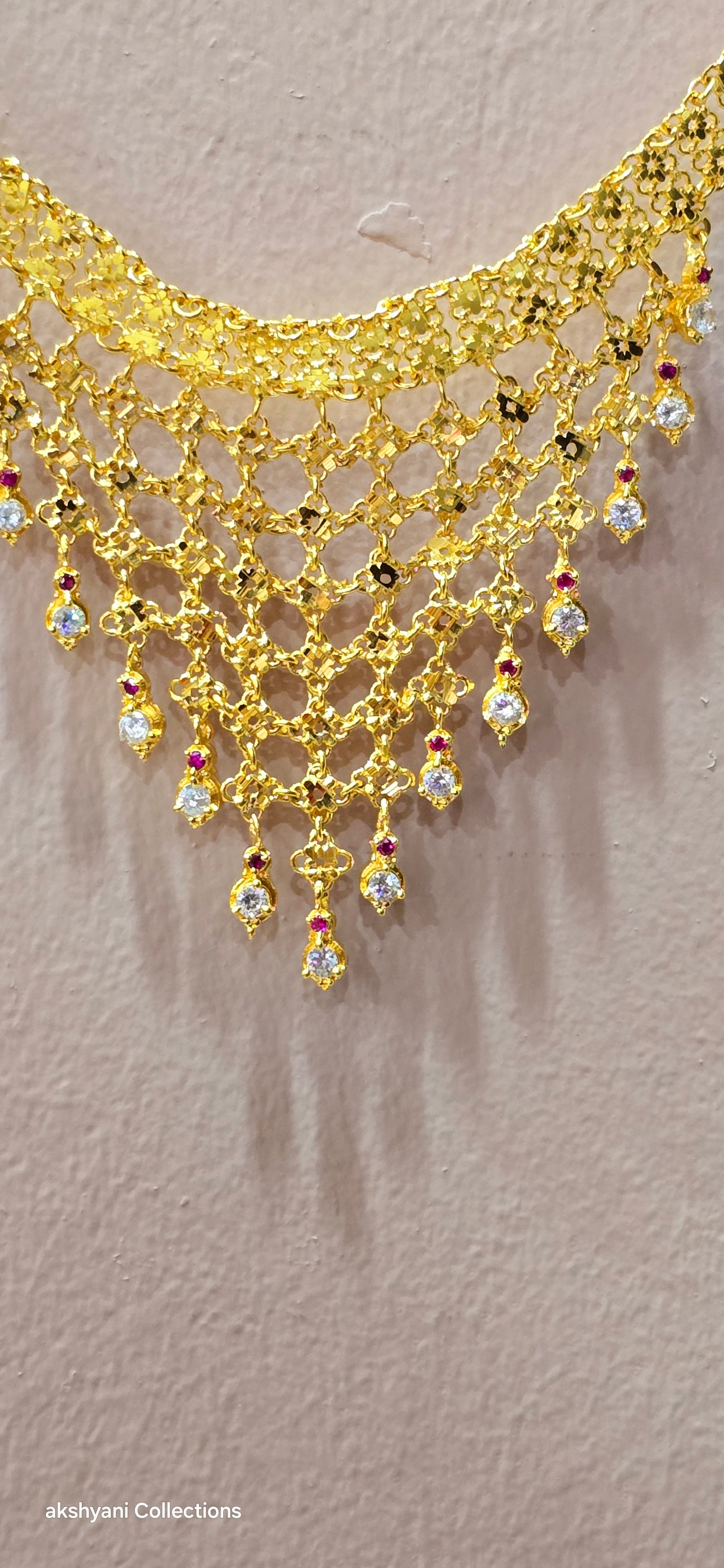 Choker set. Not 916 gold. Length up to 18 inches ( adjustable rings)