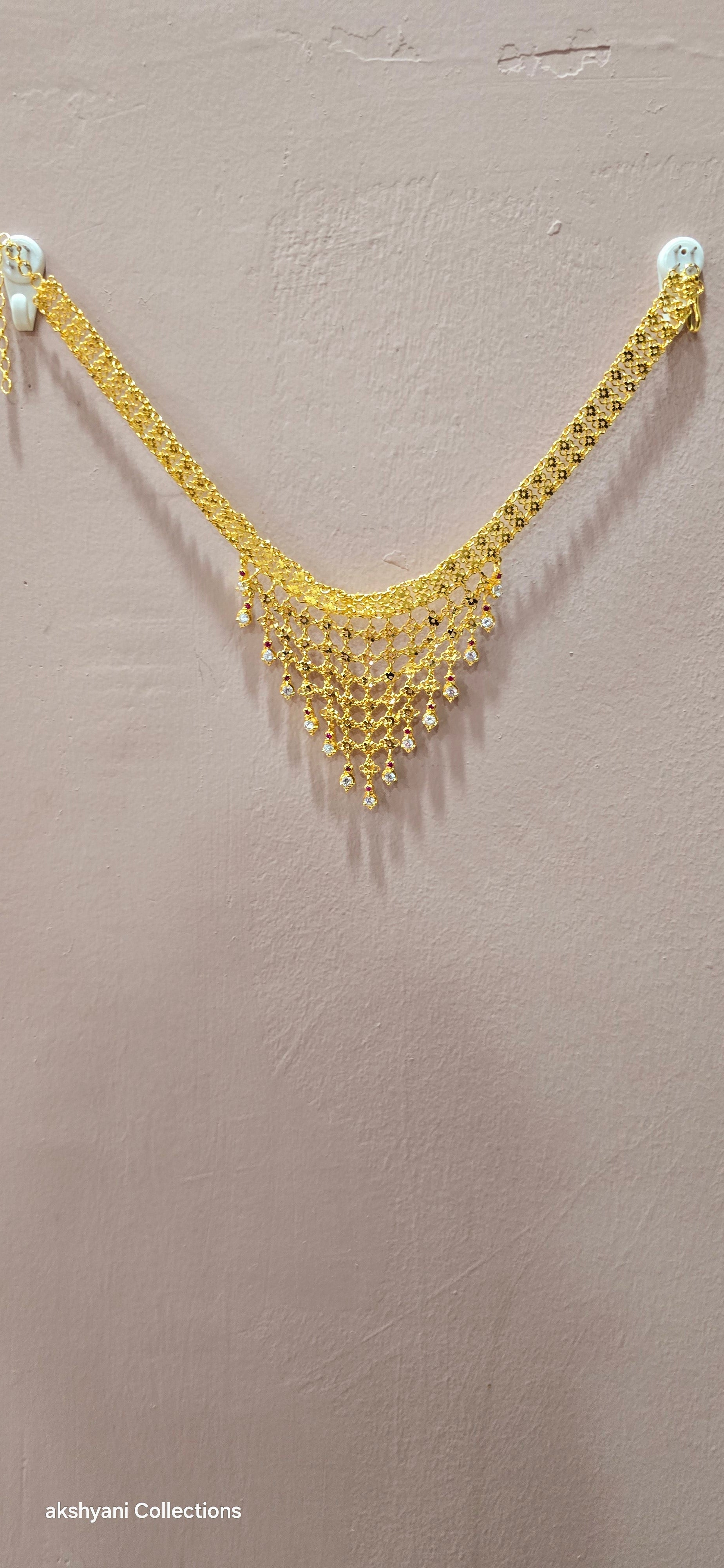 Choker set. Not 916 gold. Length up to 18 inches ( adjustable rings)