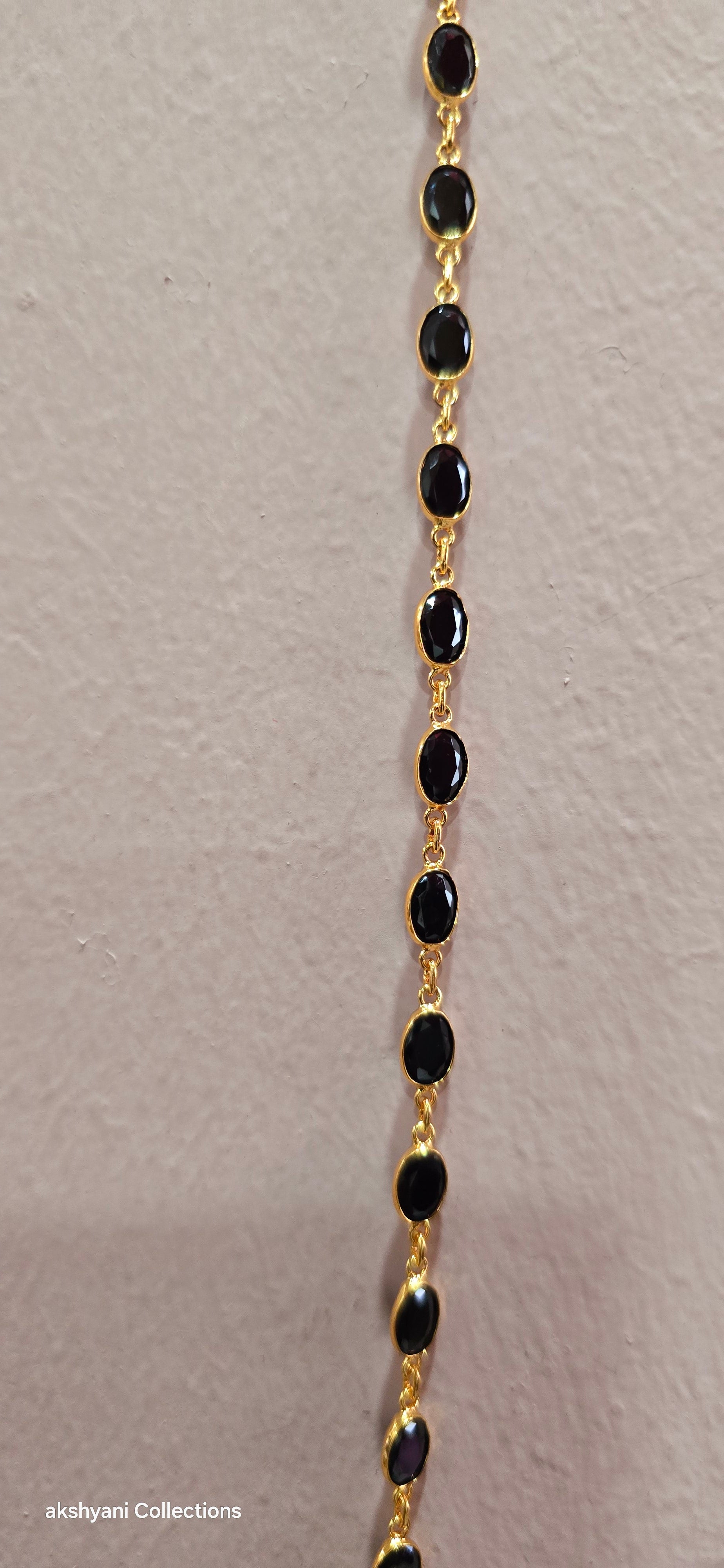 Black faucet beads. 30 inches.  Not 916 gold. Functionwear
