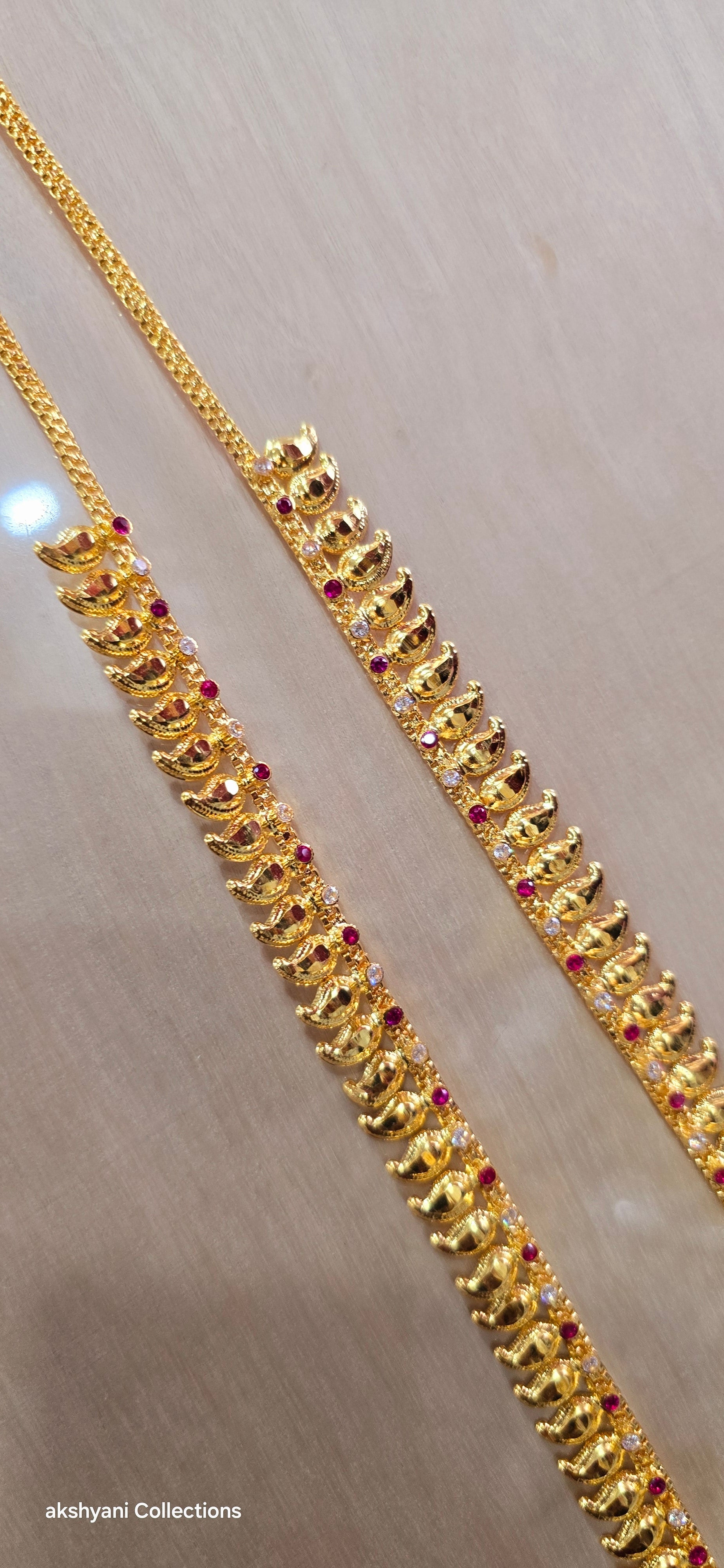 28 inches length mango chain.Not 916 gold. In stock