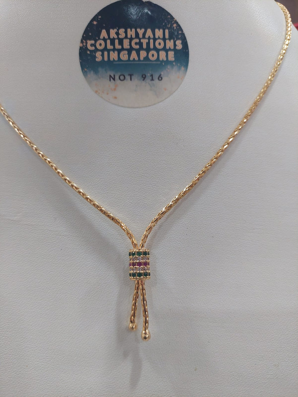 23 inches function wear chain with multi colour locket fixed. Code 472B