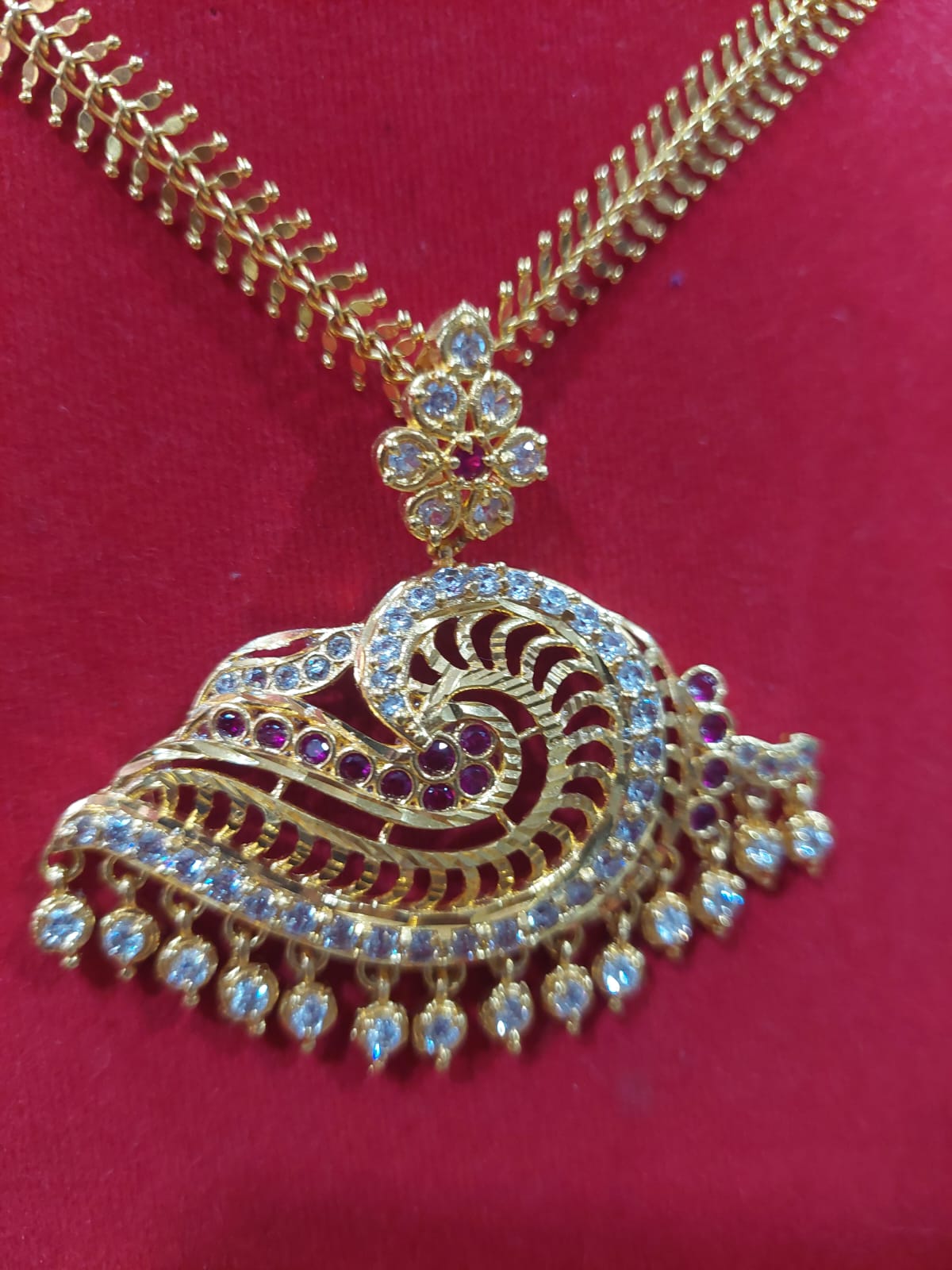 CHAIN WITH PEACOCK LOCKET