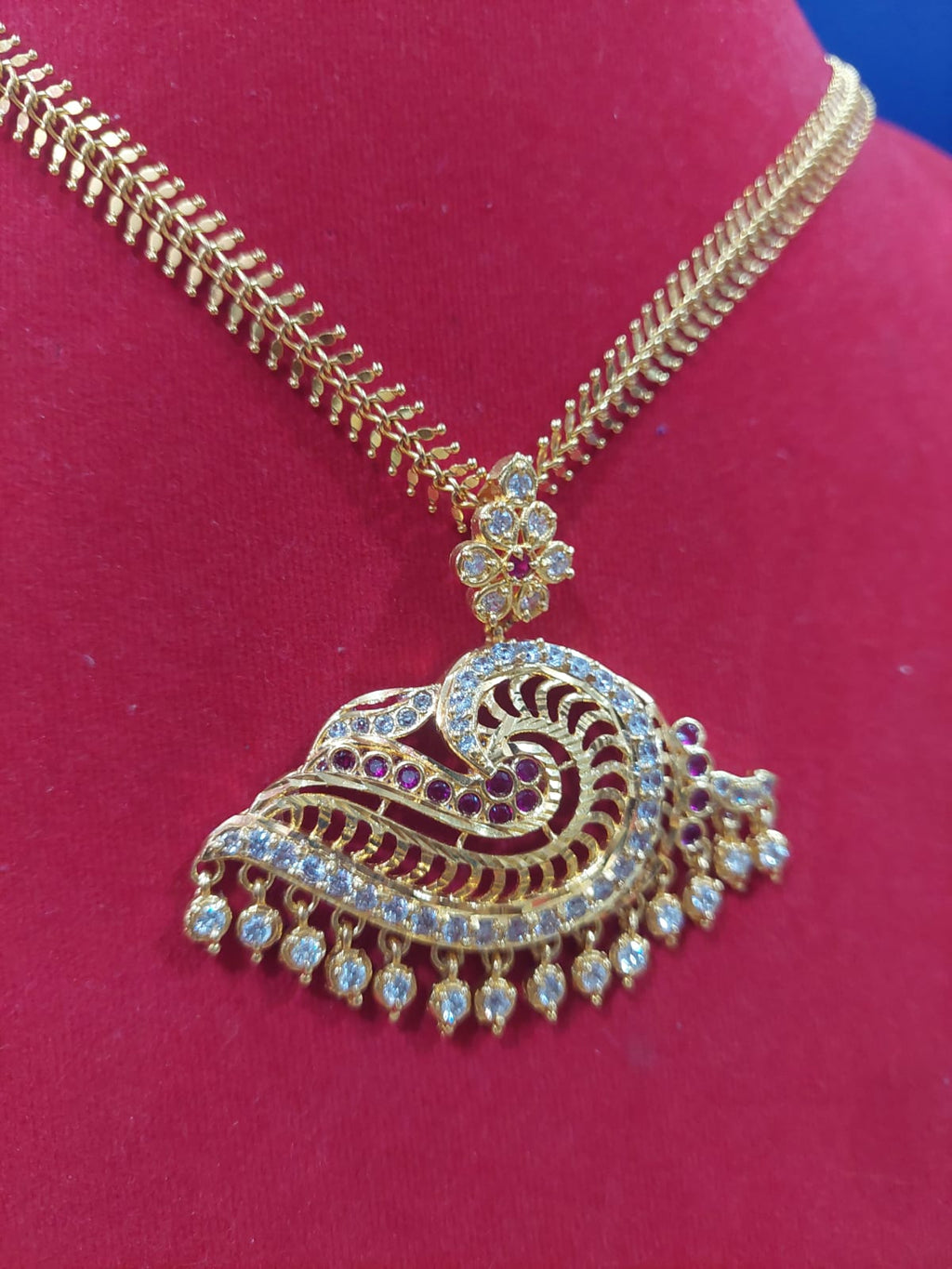 CHAIN WITH PEACOCK LOCKET