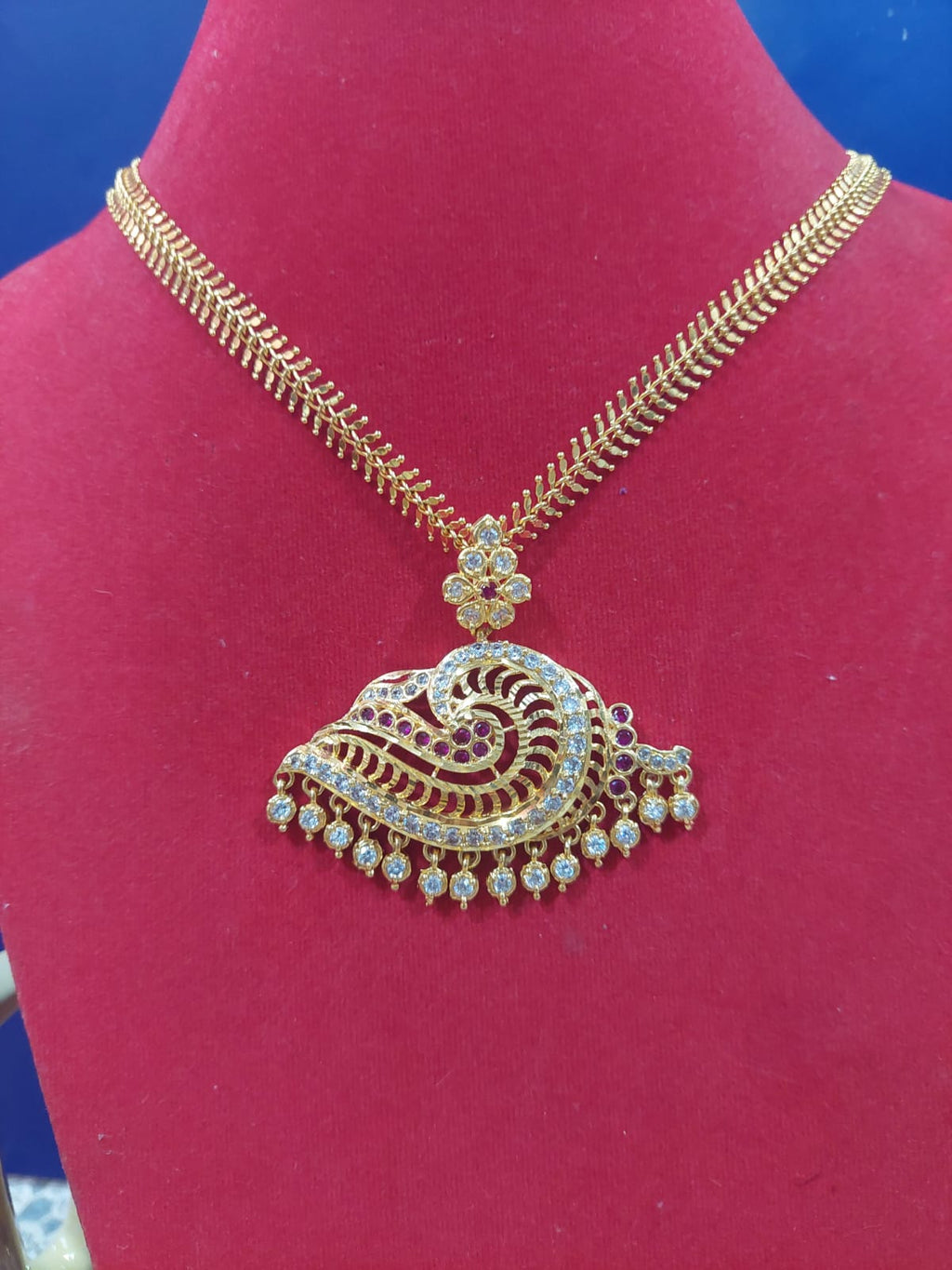 CHAIN WITH PEACOCK LOCKET