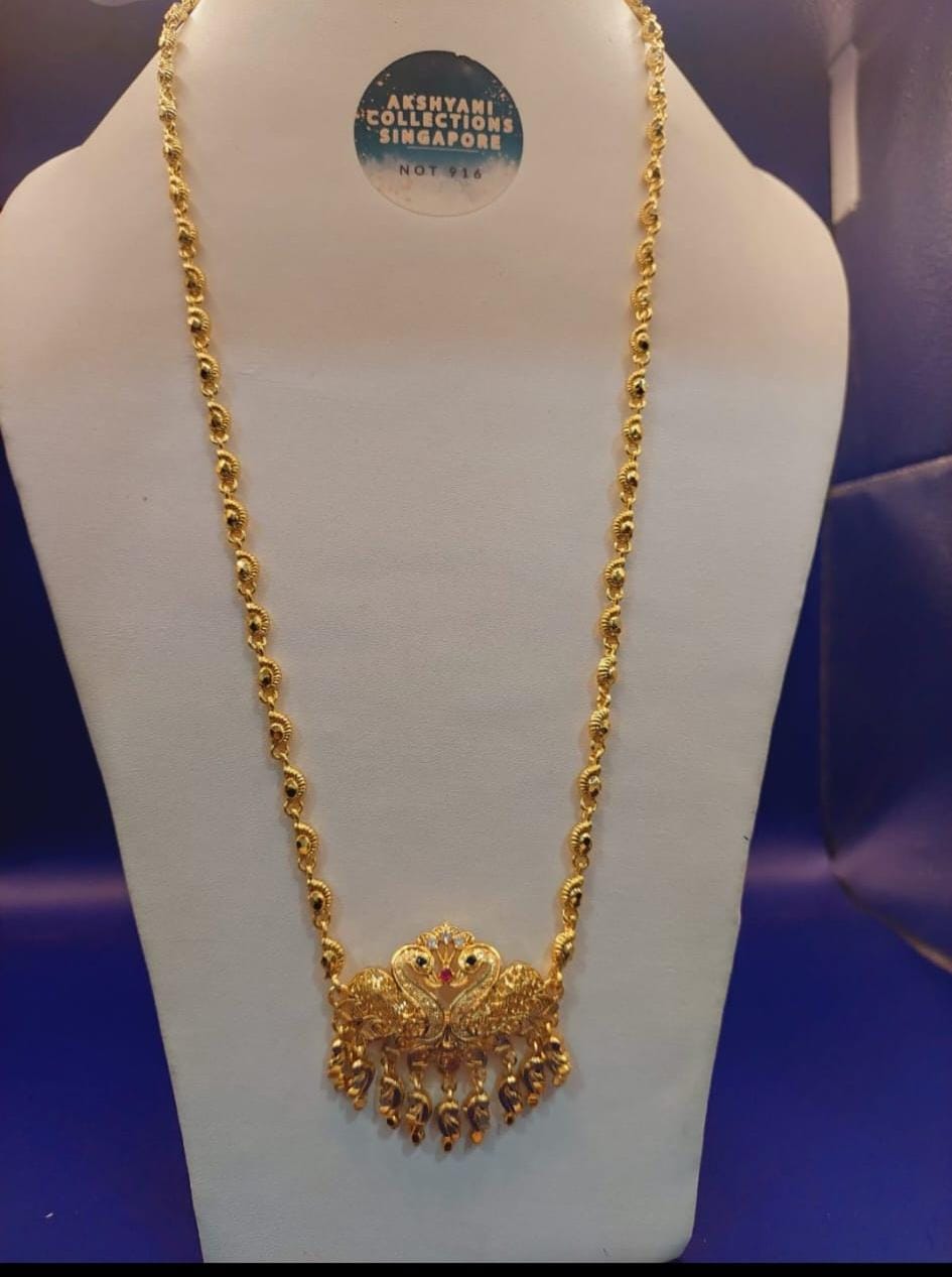 28 inches peacock paruppu chain. Functionwear type of jewellery.  NOT 916 GOLD. Code 0585